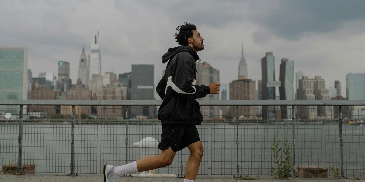 runner outside on a bridge