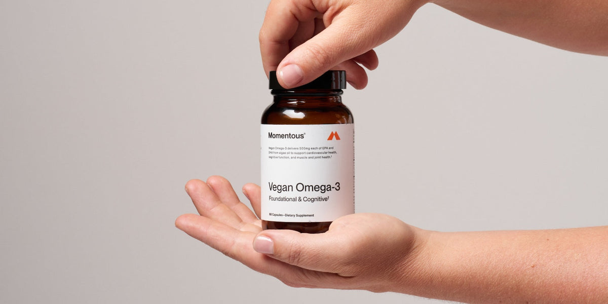 Vegan Omega-3 bottle in hand