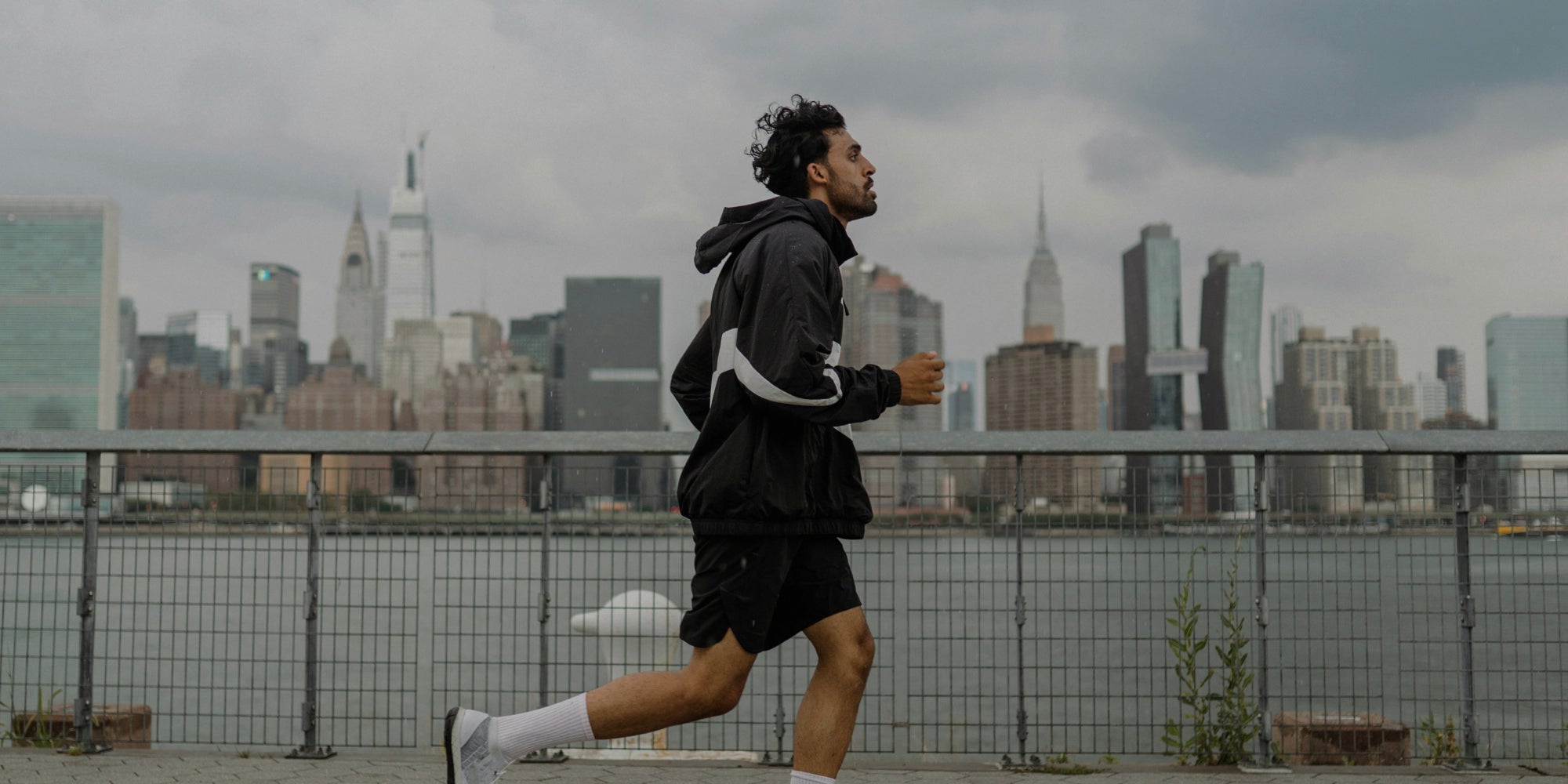 runner outside on a bridge 