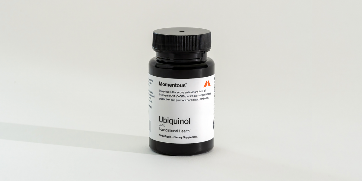 a bottle of Momentous Ubiquinol capsules