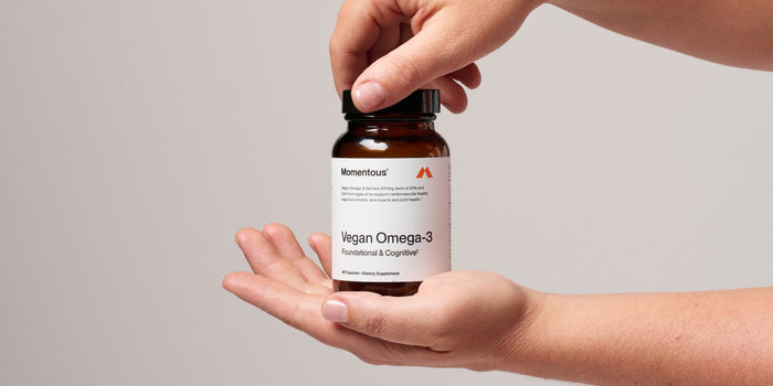 Vegan Omega-3 bottle in hand