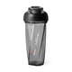 Front view of a transparent gray Helimix shaker bottle with a black screw-top lid and flip cap. The bottle has a faceted, geometric shape with embossed measurement markings on the side. Printed vertically on the front is a white Arnold Schwarzenegger signature above a small orange Momentous logo and white “Momentous” wordmark. The bottle appears designed for mixing supplements or protein shakes.