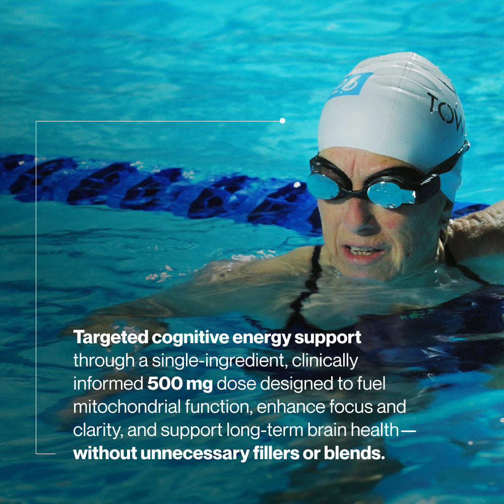 “Swimmer in pool with text: ‘Targeted cognitive energy support through a single-ingredient, clinically informed 500 mg dose designed to fuel mitochondrial function, enhance focus and clarity, and support long-term brain health—without unnecessary fillers or blends.’”