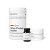 Product image of Momentous Whey Protein Isolate in chocolate flavor shown with Vitamin D3 and Creatine tubs.