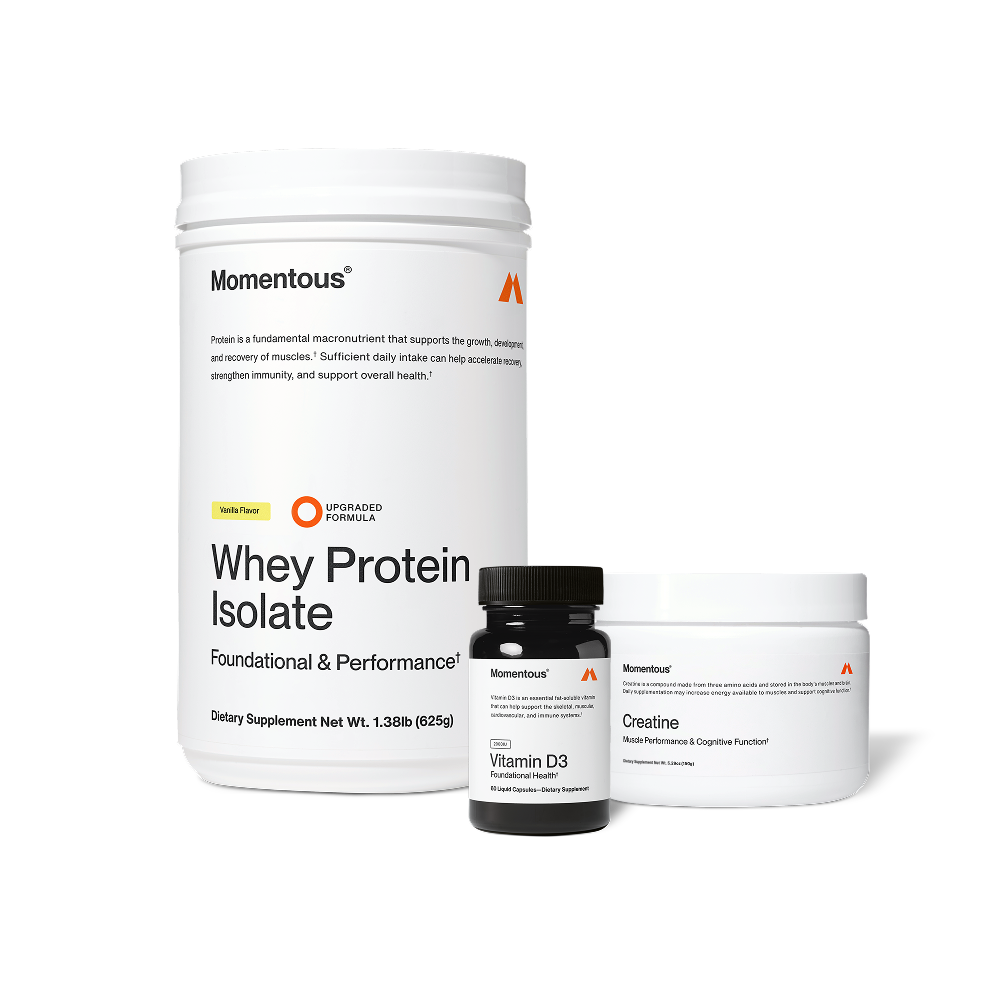 Product image of Momentous Whey Protein Isolate in vanilla flavor shown with Vitamin D3 and Creatine tubs.