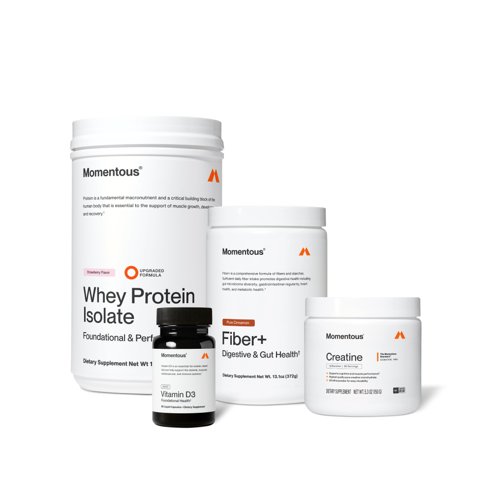 Four Momentous products on black background: Whey Protein Isolate – Strawberry Flavor, Upgraded Formula, Foundational & Performance; Vitamin D3 – 2000IU, Foundational Health, 60 Liquid Capsules; Fiber+ – Pure Cinnamon, Digestive & Gut Health, 13.1oz (372g); Creatine – Signature Spec, Unflavored, 30 Servings, 5.3oz (150g), NSF Certified for Sport.