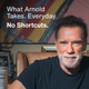 Arnold Schwarzenegger seated indoors with a Momentous product visible beside him. Text reads: What Arnold Takes. Everyday. No Shortcuts.