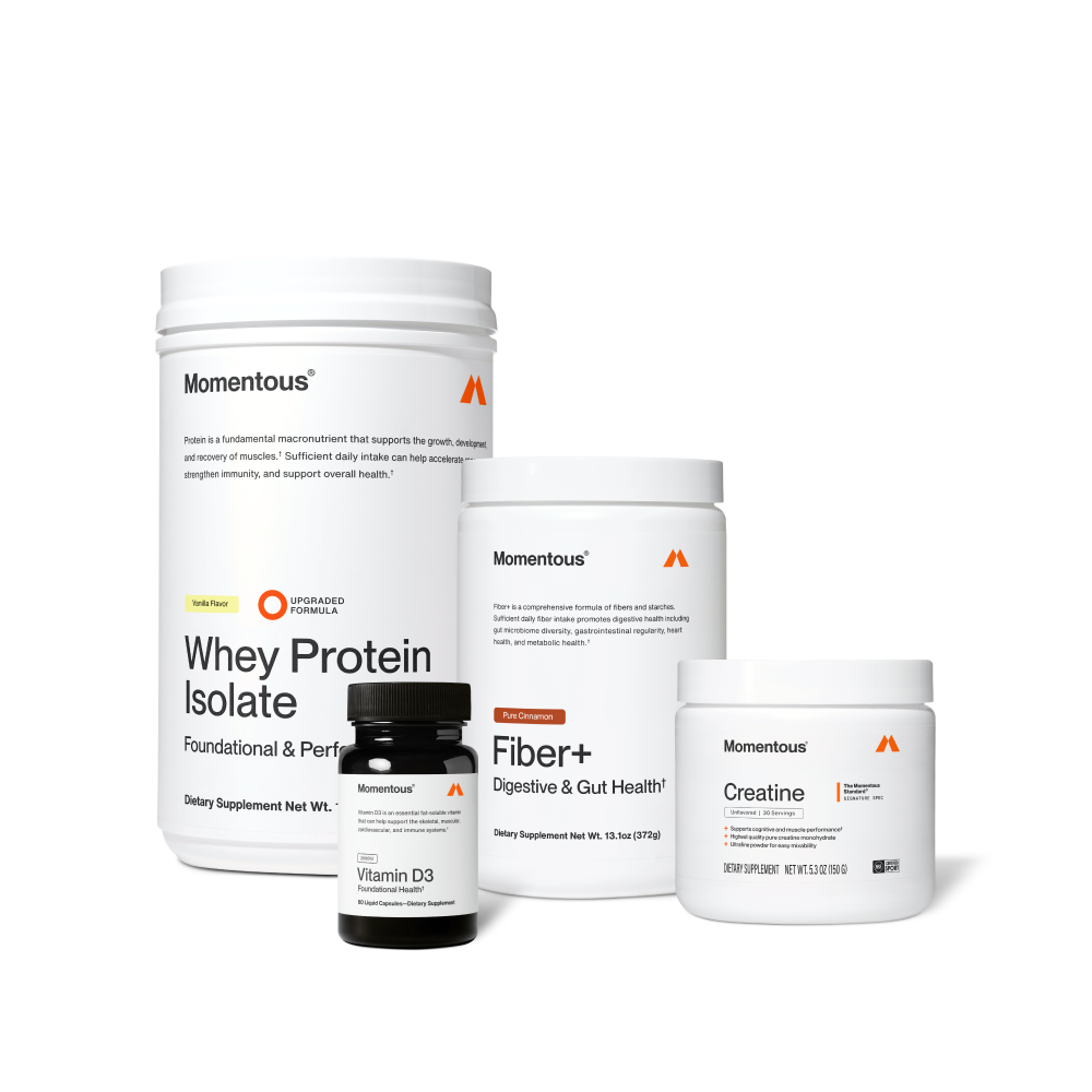 Four Momentous products on black background: Whey Protein Isolate – Vanilla Flavor, Upgraded Formula, Foundational & Performance; Vitamin D3 – 2000IU, Foundational Health, 60 Liquid Capsules; Fiber+ – Pure Cinnamon, Digestive & Gut Health, 13.1oz (372g); Creatine – Signature Spec, Unflavored, 30 Servings, 5.3oz (150g), NSF Certified for Sport.