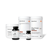 Five Momentous supplement bottles displayed: collagen powder, magnesium capsules, recovery powder, whey protein isolate, and