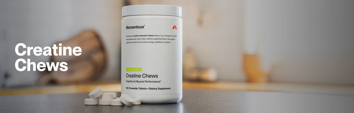 Momentous Creatine Chews – Lemon Lime flavor, 150 Chewable Tablets for Cognitive & Muscle Performance, displayed in white jar with loose chews on a countertop