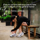 Athletic woman in black Nike gear tying her shoes before a workout, with testimonial text praising the convenience and taste of Momentous Collagen Shot.