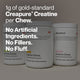 Product benefit image featuring three containers of Momentous Creatine Chews in the background. Large text in the foreground reads: “1g of gold-standard Creapure® Creatine per Chew.” Below, stacked statements read: “No Artificial Ingredients. No Fillers. No Fluff.”