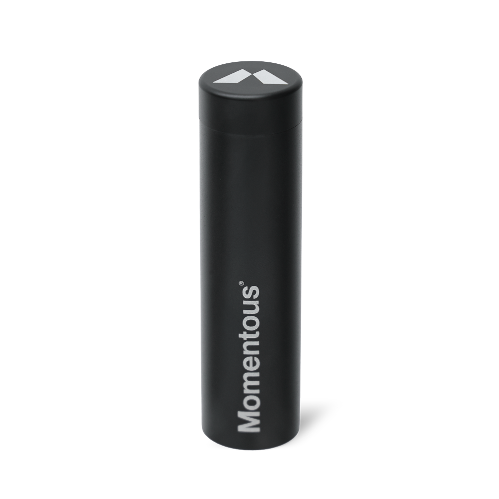 Black Momentous travel tube for carrying creatine chew supplements