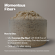 Fiber+ powder in clear container with tan-colored granules heaped on top against gray background.