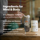 Ingredients for Mind and Body, Momentous Pre-Workout: a hand tips a scoop of powder into a shaker bottle beside the tub on a wooden gym bench, with a 2 to 1 L-Theanine to Caffeine ratio for balanced stimulation, L-Citrulline and Betaine to support muscular endurance and strength, and Alpha-GPC and L-Tyrosine to help maintain cognitive performance in hard sessions. (366 chars)