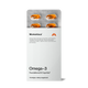 A Momentous Omega-3 travel pack with a blister card of softgel capsules partially visible above a white sleeve package on a black background. Text on the packaging reads: “Momentous®” “Omega-3 fatty acids play a critical role in cell membranes throughout the brain and body. They can help support cardiovascular health, cognitive function, and muscle and joint recovery.” “Omega-3” “Foundational & Cognitive†” “10 Softgels—Dietary Supplement”