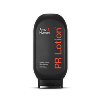Black bottle of PR Lotion by Amp Human on a black background. Label reads: “Amp Human®,” “PR Lotion®,” “Sports lotion with bicarb,” and “10–15 Uses 10.6 oz (300g).”