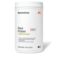 White container of Momentous Plant Protein powder in Vanilla Spice flavor, 1.5 lb size with orange logo and label details.