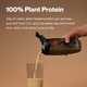 Hand pouring vegan vanilla plant protein powder from black shaker bottle into glass against beige background. Copy reads '100% Plant Protein. 20g of clean, plant-based protein per serving - sourced from US and Canadian pea and brown rice - with a full amino acid profile.'