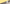 Momentous Pre-Workout Lemonade tub tilted on a concrete ledge against a split yellow and gray wall, PRE Workout wordmark in the corner. (135 chars)