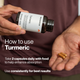 How to use Momentous Turmeric, take 2 capsules daily with food to help enhance absorption and use consistently for best results. A man in a dark plum shirt tips the 60 capsule bottle toward his open palm holding two orange capsules. (232 chars)