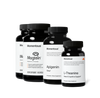 Group product shot of four Momentous dark amber supplement bottles with black caps. Labels read: two 