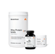 Group product shot of three Momentous supplements: a large white 