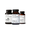 Three Momentous supplement bottles: Magnesium L-Threonate capsules, Omega-3 softgels, and Tongkat Ali capsules.